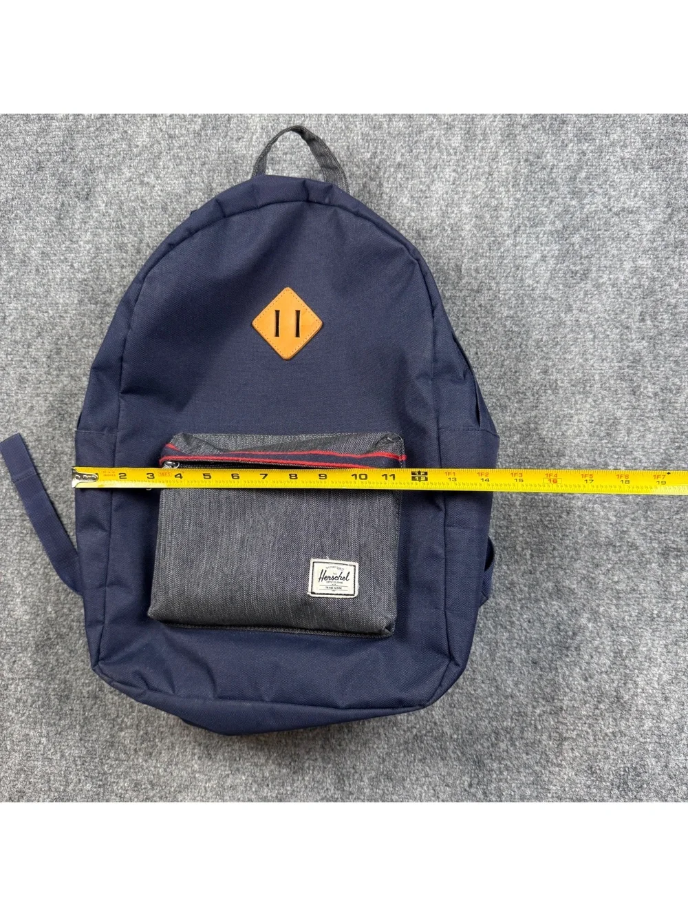 Herschel Navy Blue Backpack with Front Pocket and Red Striped Interior
